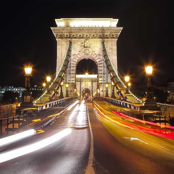 Traffic on Széchenyi Chain bridge over Danube river, Budapest city, Hungary. Night scene
